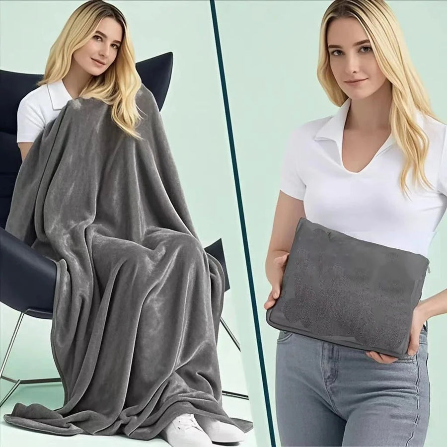 Coral fleece travel blanket folded as a pillow